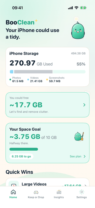 The BooClean home screen on iPhone, showing iPhone storage usage and a Find the clutter button.